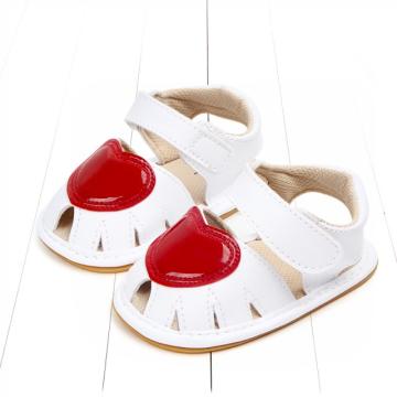 Sandalute fetite albe cu inimioara rosie de la Alda Clean Service Srl